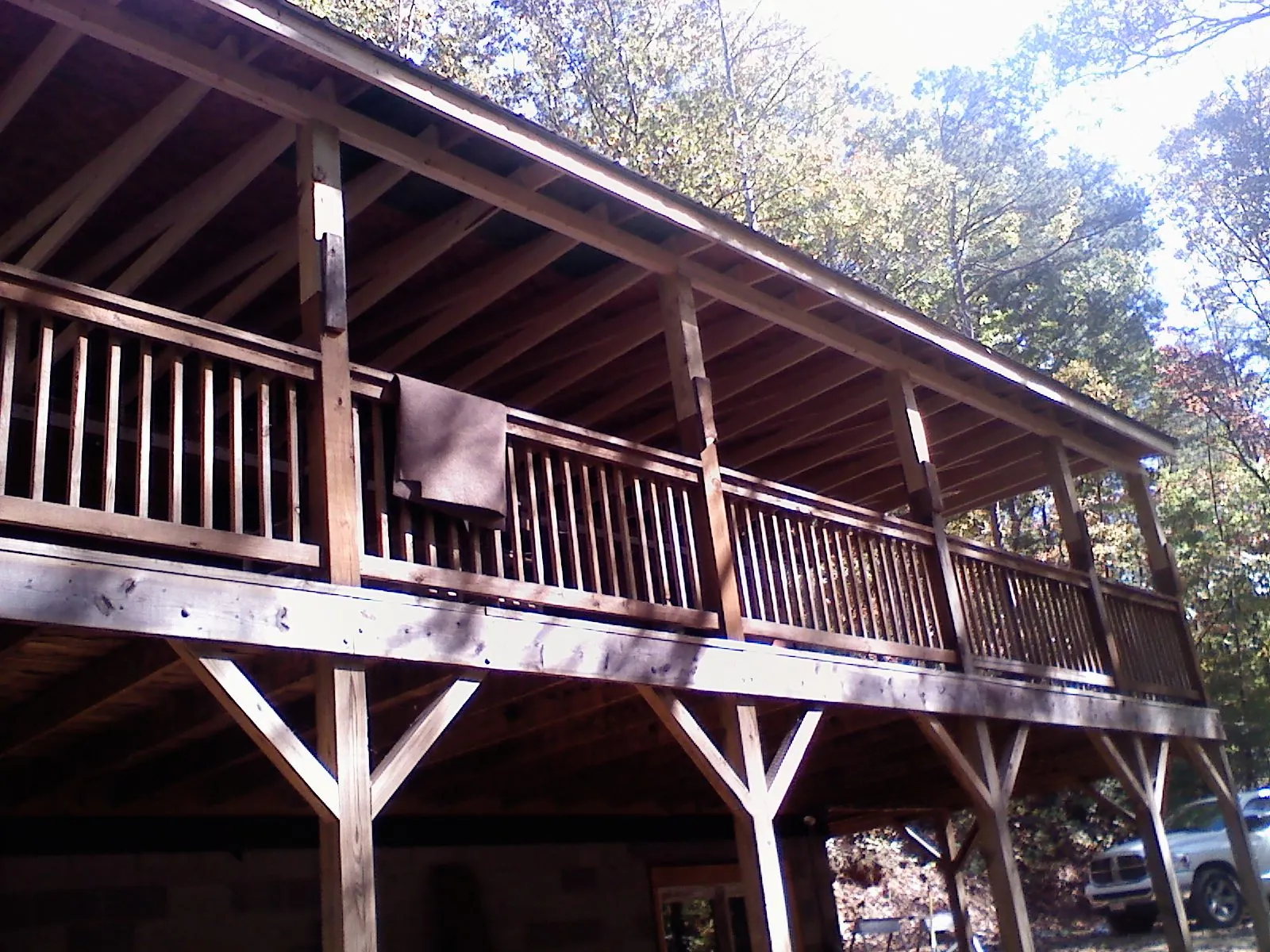 Timber framing under a new elevated porch and deck — Roof Leak Repair in Peachland by Roofing Brothers